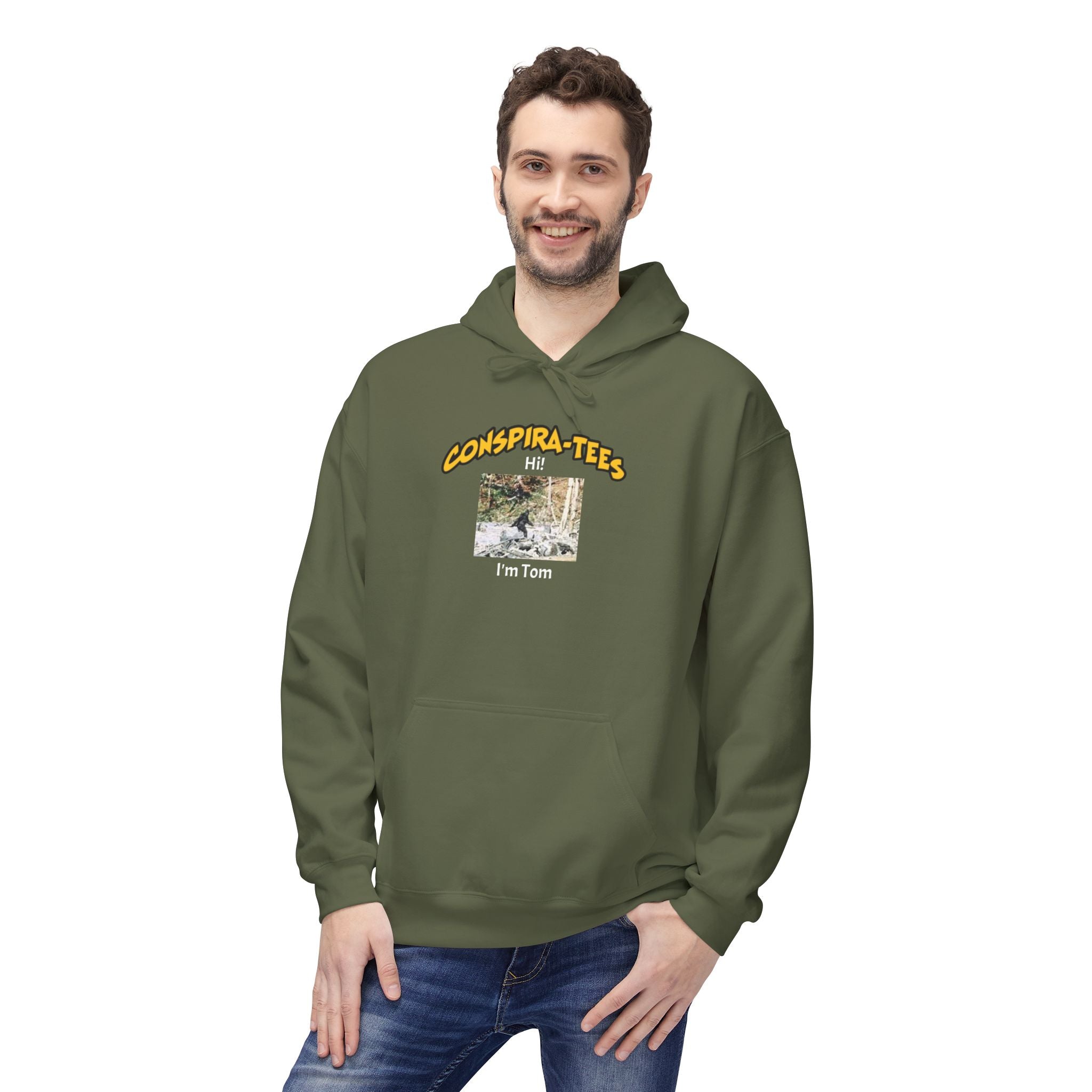 Bigfoot. “Hi I’m Tom,” Conspira-tee. Bigfoot is described as a massive, bipedal ape standing 6 to 10 feet tall, covered in thick hair, and roaming the remote forests of the US Pacific Northwest.