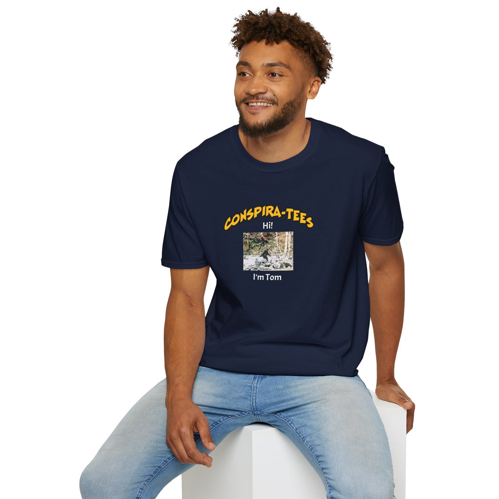 Bigfoot. “Hi I’m Tom,” Conspira-tee. Bigfoot is described as a massive, bipedal ape standing 6 to 10 feet tall, covered in thick hair, and roaming the remote forests of the US Pacific Northwest.