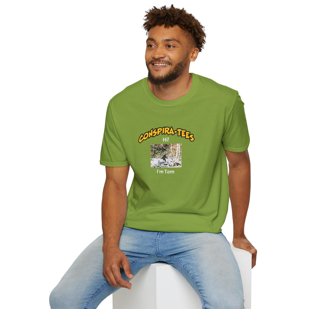 Bigfoot. “Hi I’m Tom,” Conspira-tee. Bigfoot is described as a massive, bipedal ape standing 6 to 10 feet tall, covered in thick hair, and roaming the remote forests of the US Pacific Northwest.