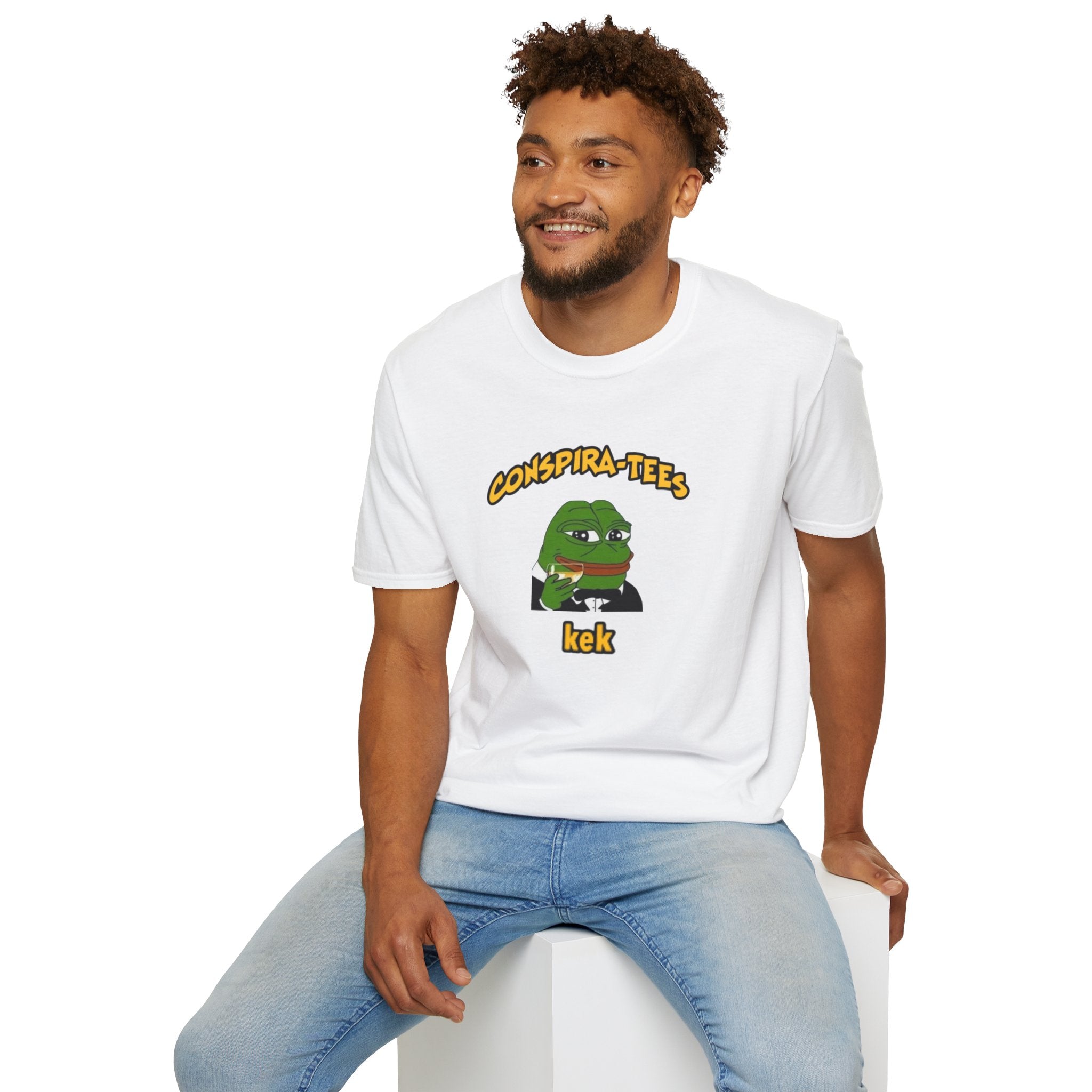 Kek Conspira-tee. Pepe at one point in time was the face of conspiracy memes on 4 chan and 8 chan. Kek is netspeak for lol. Mocking your enemy.