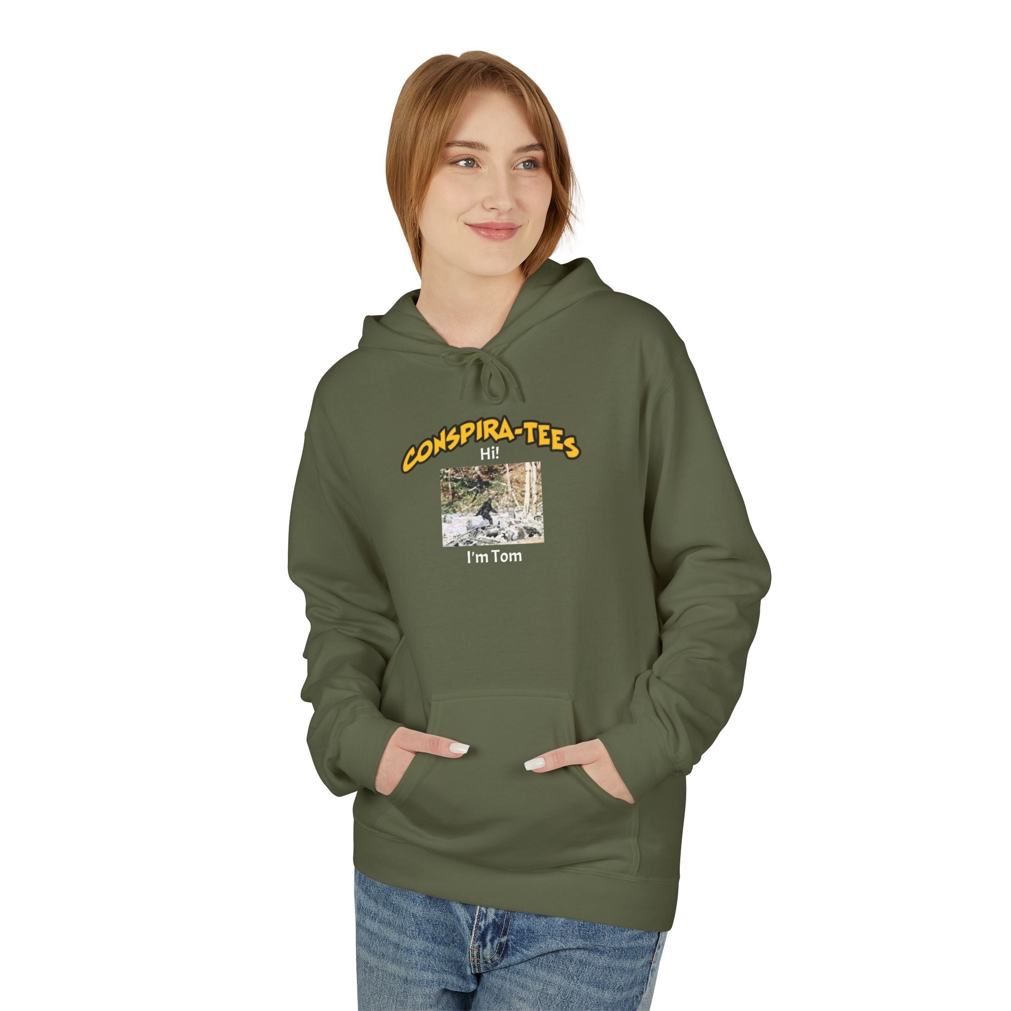 Bigfoot. “Hi I’m Tom,” Conspira-tee. Bigfoot is described as a massive, bipedal ape standing 6 to 10 feet tall, covered in thick hair, and roaming the remote forests of the US Pacific Northwest.