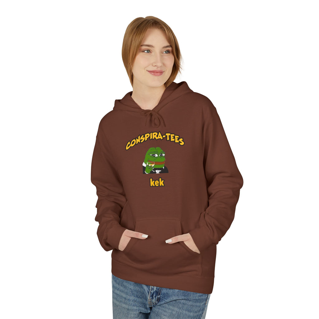 Kek Conspira-tee. Pepe at one point in time was the face of conspiracy memes on 4 chan and 8 chan. Kek is netspeak for lol. Mocking your enemy.